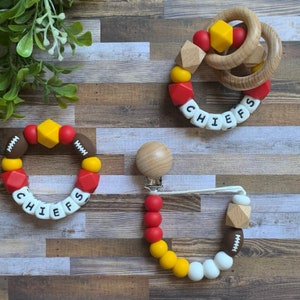 Kansas City Chiefs Toy Collection, Chiefs Baby Gift Pacifier Clip, Baby Chiefs Toy Rattle - Red, Yellow, Football - Chiefs Baby Shower Gift