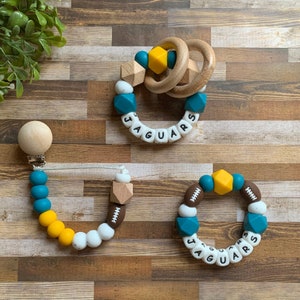 Jacksonville Jaguars Toy Collection - Football Pacifier Clip - Jaguars Baby Toy - Baby Rattle - Blue, Yellow - Football - Baby Gift - Shower