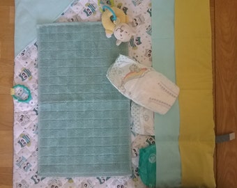 Nomadic changing mat with storage - Changing bag