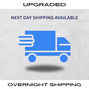 May include: A blue delivery truck icon with three speed lines, indicating fast shipping. The text "UPGRADED" is at the top, with "NEXT DAY SHIPPING AVAILABLE" and "OVERNIGHT SHIPPING" below the truck.