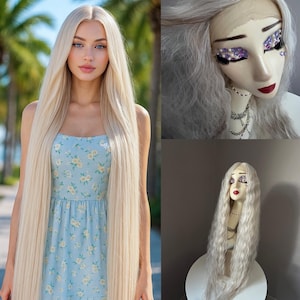 May include: A woman with long, straight, platinum blonde hair, wearing a light blue floral dress. The image also shows a mannequin head with a long, wavy, silver wig and elaborate eye makeup. Another mannequin head with a silver wig is also shown.