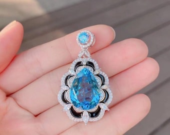 Blue Topaz Teardrop Pendant: Sterling Silver Halo Necklace with Zircon
