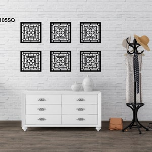 May include: Six black geometric wall decor panels with a repeating pattern of circles and squares. The panels are arranged in two rows of three. The panels are mounted on a white brick wall. The text "JLC 105SQ" is visible in the top left corner of the image.