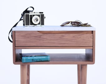 Bedside table, Nightstand, Mid century  with marble top, shelf and upper drawer in solid Walnut.