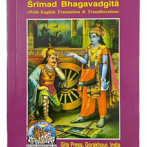 May include: A purple book cover with the title "Śrīmad Bhagavadgītā" in yellow. The cover features an illustration of two figures in traditional Indian attire. The book is published by Gita Press, Gorakhpur, India.