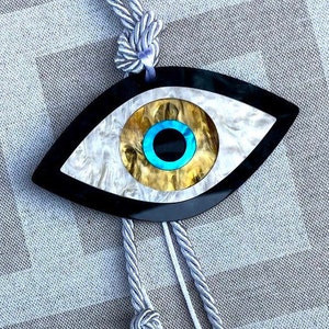 Evil-Eye Wall-Hanging in Ivory and Gold