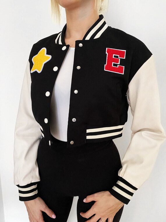 EMBR PATCHES WOMAN VARSITY in black