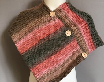 A Lovely Handmade Knitted Soft Baby Poncho in Great Autumn tones of Brown and Soft Pink