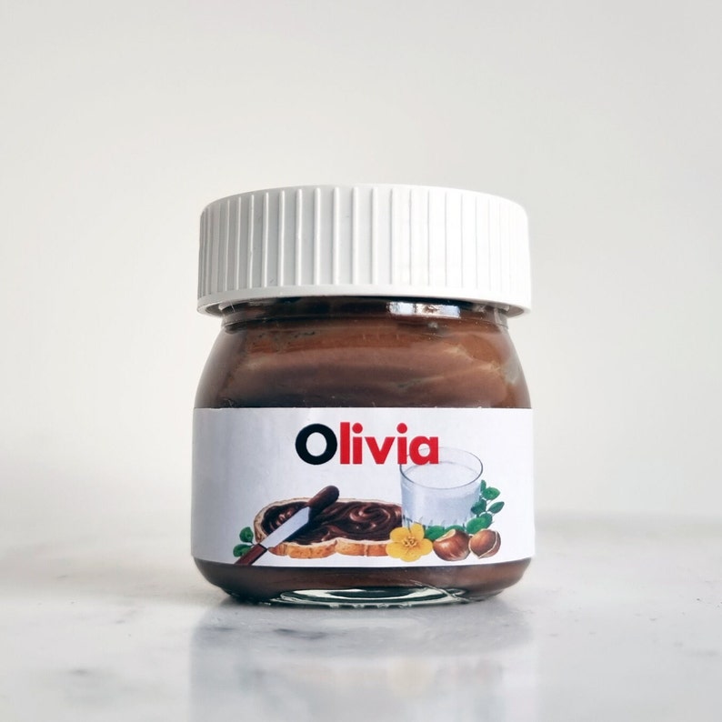 This is a mini Nutella jar with a customised label on a lovely glossy label printed on the highest quality inks so the colours stand out and the glossy material shines.