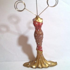 Vintage Metal Lady Figurine With 3 Wire Placecard Holders.
