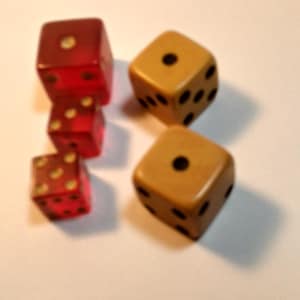 5 Dice, 2 Small Translucent Red and 2 Large. @ Rounded Edged Bone or Bakelite.