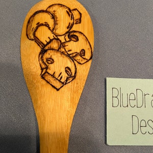 Bamboo cooking spoon with Woodburned design