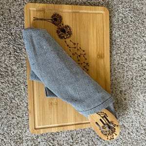 Bamboo charcuterie/cutting board with wood burned by hand blowing dandelion design gift set