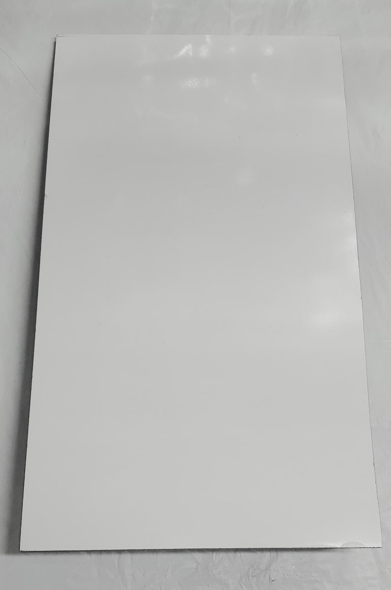 May include: A plain white sheet of paper.