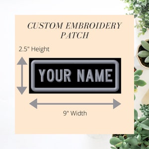 May include: Custom embroidery patch with the text "YOUR NAME" in silver lettering on a black background. The patch is 9 inches wide and 2.5 inches high. The words "CUSTOM EMBROIDERY PATCH" are above the patch.