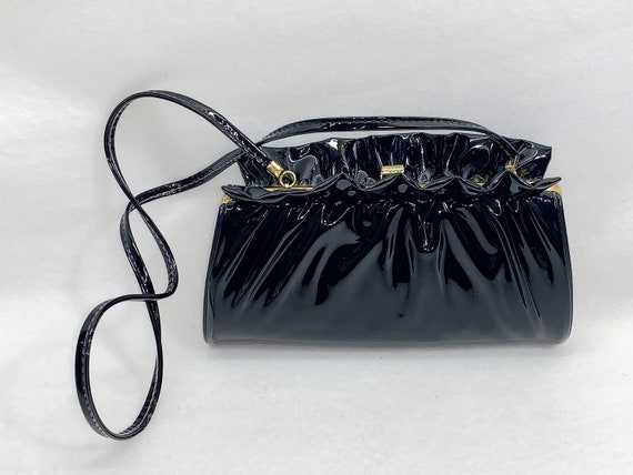 clean patent leather bag