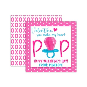 May include: Pink Valentine's Day card with a white polka dot background and a pink ring pop with a blue ring. The card says "Valentine, you make my heart pop" and "Happy Valentine's Day! From: Penelope".