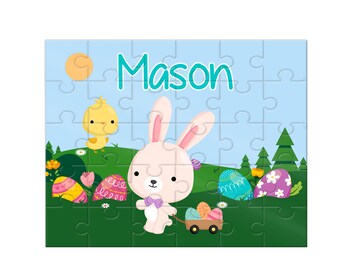 May include: A personalized Easter puzzle featuring a pink bunny carrying a basket of colorful eggs, a yellow chick, and the name "Mason".
