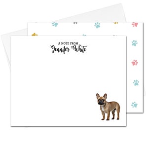 May include: A white card with a blue, pink, and yellow paw print pattern on the back. The front of the card has the text "A note from Jennifer White" and a brown and white French bulldog.