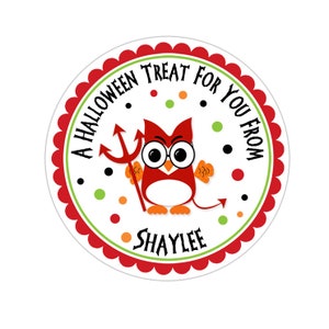 May include: A round Halloween treat sticker with a red and white devil owl holding a pitchfork. The sticker has the text "A Halloween Treat For You From Shaylee" around the edge.