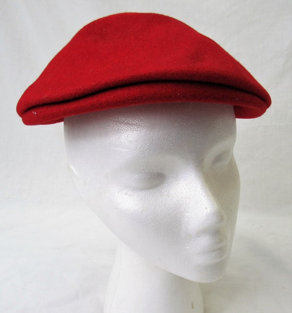 red driving cap