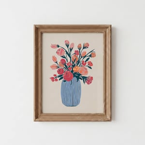 May include: A framed wall art print featuring a stylized illustration of a bouquet of pink, red, and orange flowers in a blue vase with vertical line textures. The artwork is set against a cream background and enclosed in a weathered brown wooden frame.