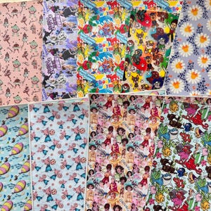 May include: A collection of patterned faux leather sheets. Designs include cartoon characters, floral patterns, and whimsical illustrations in various colors. Ideal for crafting projects.