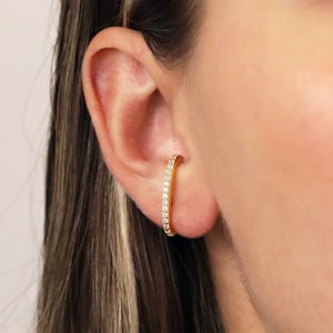 Breteloorbellen • gouden oorstekers • manchetoorbellen • gouden oorstekers • minimalistische sieraden