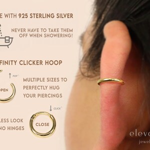 May include: Gold infinity clicker hoop earring made with 925 sterling silver. The hoop is seamless and has no hinges. It is shown in an open and closed position. The text "Made with 925 Sterling Silver" and "Never have to take them off when showering!" is shown above the image. The text "Infinity Clicker Hoop" is shown below the image. The text "Seamless look with no hinges" is shown below the open hoop. The text "Multiple sizes to perfectly hug your piercings" is shown to the right of the open hoop. The text "Open" is shown inside the open hoop. The text "Close" is shown inside the closed hoop. The text "elevado jewelry" is shown in the bottom right corner of the image.