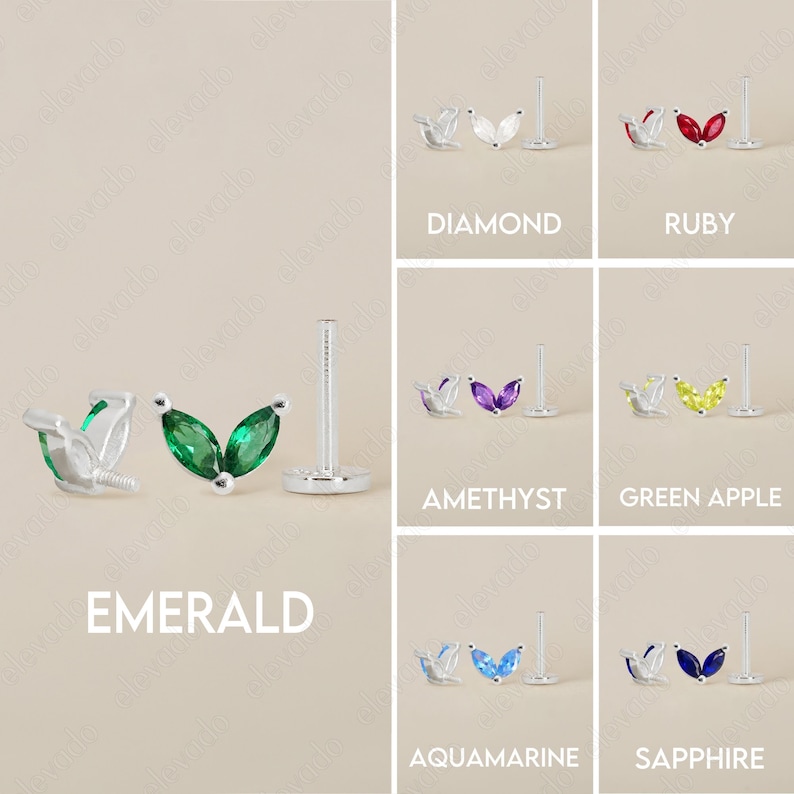 Może przedstawiać: Zestaw 10 srebrnych kolczyk&oacute;w w kształcie liści z r&oacute;żnokolorowymi kamieniami szlachetnymi. Kamienie szlachetne to: diament, rubin, ametyst, zielone jabłko, szmaragd, akwamaryn i szafir.