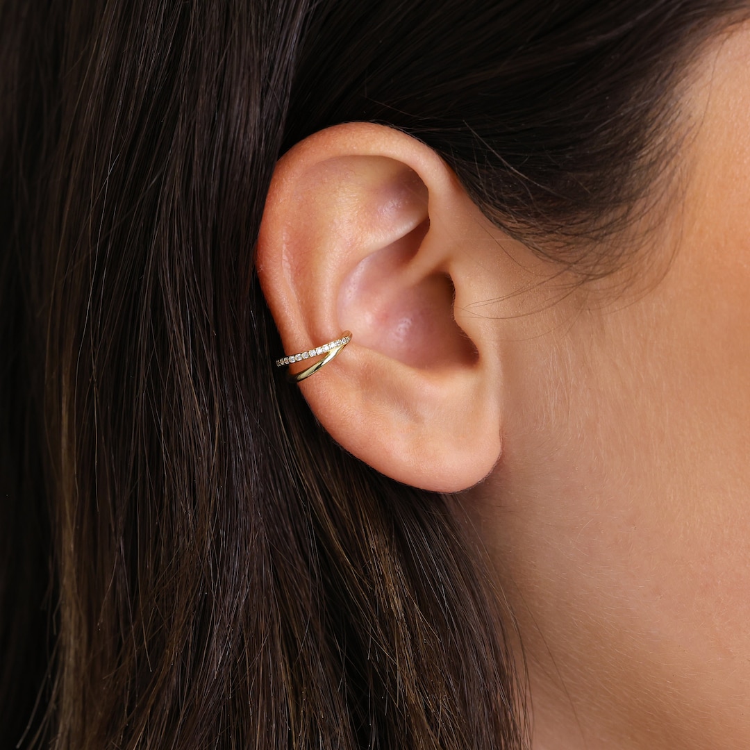 Conch pave hug clicker on sale hoop