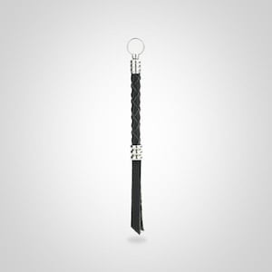 May include: A black leather keychain with a braided design and silver metal accents.