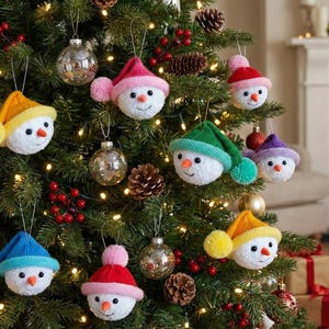 May include: A decorated Christmas tree with various ornaments. The tree features snowman-shaped ornaments with colorful hats in yellow, blue, pink, green, and purple. Silver and gold baubles, pine cones, and red berries add to the festive holiday decor.