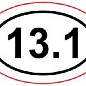 May include: A white oval sticker with a black border and red outline. The sticker features the number "13.1" in black.