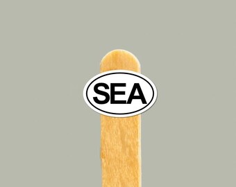 SEA Vinylklistermärke — Resepresent till Seattle, vattenflaska och laptopdekal