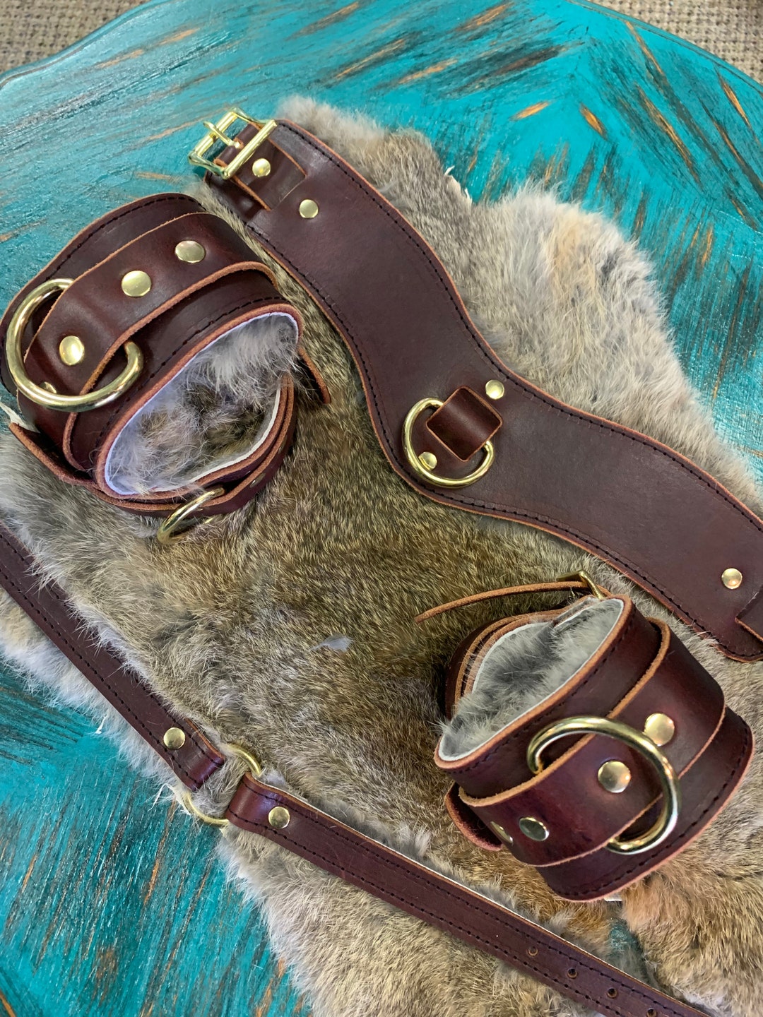 Latigo Leather Sewn Into Spanish Rabbit Lining With Gold Hardware Cuffs
