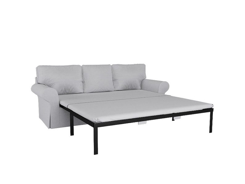 May include: A light gray fabric futon sofa with a black metal frame. The sofa is unfolded and the mattress is extended to form a bed.