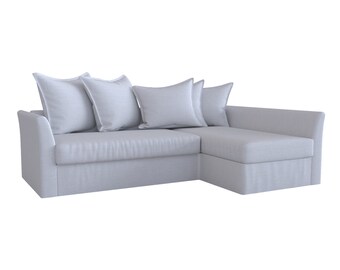 May include: A light gray sectional sofa with four white throw pillows. The sofa has a chaise lounge on the right side.