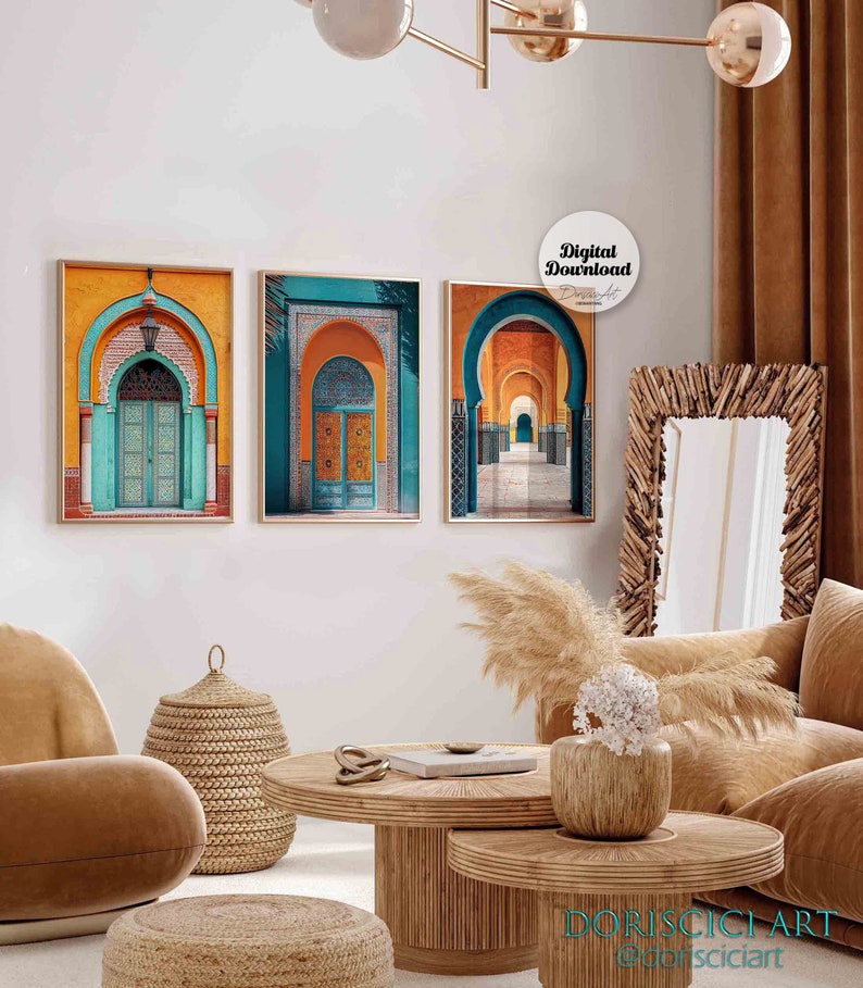 May include: Three framed prints of colorful Moroccan architecture with arched doorways and intricate tile work. The prints are hung on a white wall in a living room setting.