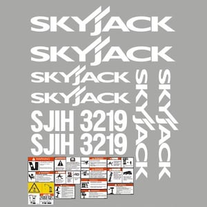 Puede incluir: Logotipo blanco "SKYJACK" y texto "SJII 3219" sobre fondo gris. La imagen también incluye varias etiquetas de advertencia y peligro con varios símbolos y texto de seguridad.
