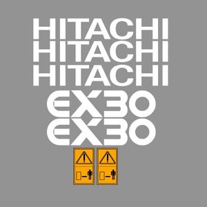 以下が含まれることがあります： グレーの背景に、白文字で「HITACHI」が3回、「EX30」が2回繰り返されています。下部には、人型と危険シンボルが描かれた2つの黄色の警告サインがあります。