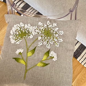 Throw pillow cover with hand embroidered dandelion flowers and leaves