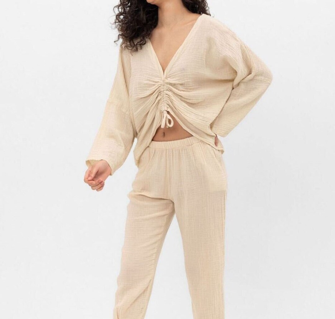 MILES BETWEEN US WOVEN TOP