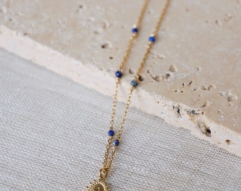 Moon necklace - steel pendant and lapis lazuli beads