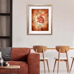 May include: A framed illustration of a red squirrel sitting inside a gold geometric circle on a brown background.