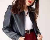 Vintage 90s long sleeve zip faux snake leather black jacket.