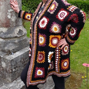 Long crochet cardigan handmade in the English Lake District. Boho hippy festival ready.