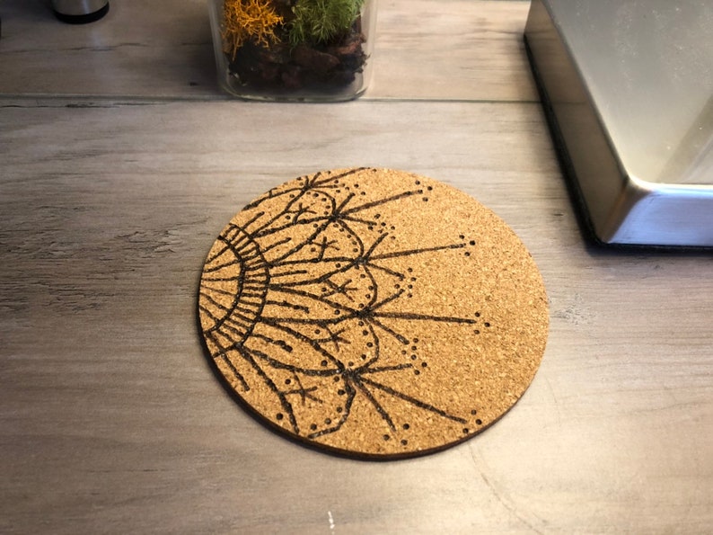 Cork coaster with flower mandala design woodburning