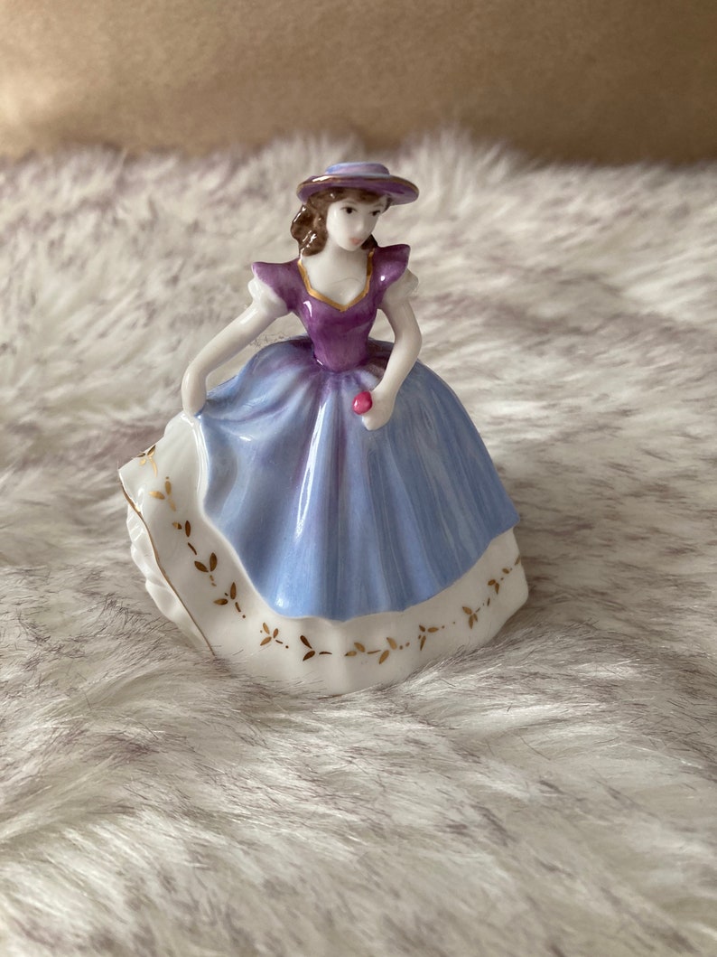 Presenting A Truly Beautiful figurine “Faith.” Vintage with dainty intricate details, by Coalport, Miniature Ladies Collection.