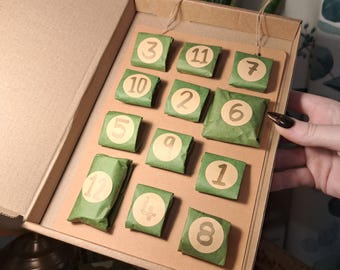 Plastic-free 12 Day Crystal Advent Calendar. A magical way to count down to Christmas. Whimsical witchy gift